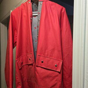 Lady van heusen raincoat red.